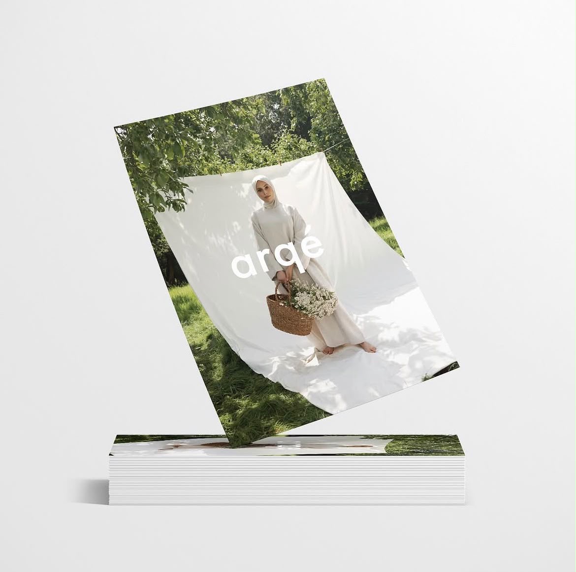 Arqé lookbook cover met buitenfotografie