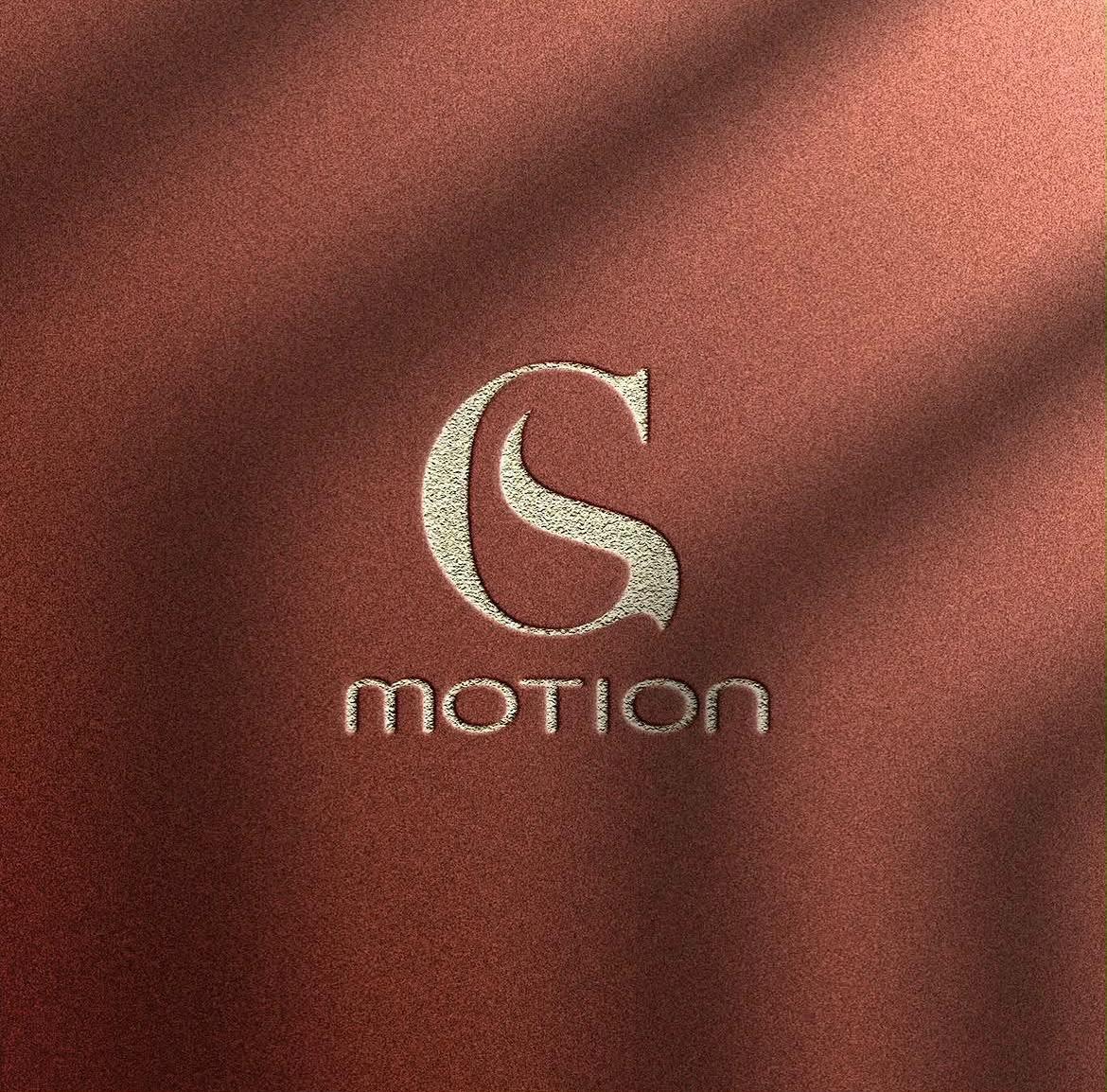 CS Motion logo geborduurd op stof